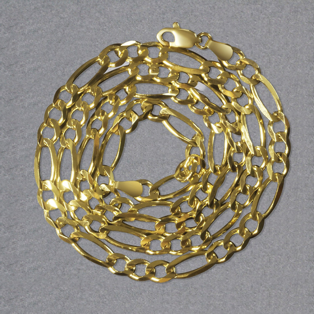 Cadena Figaro maciza de oro amarillo de 10 quilates (4,50 mm)