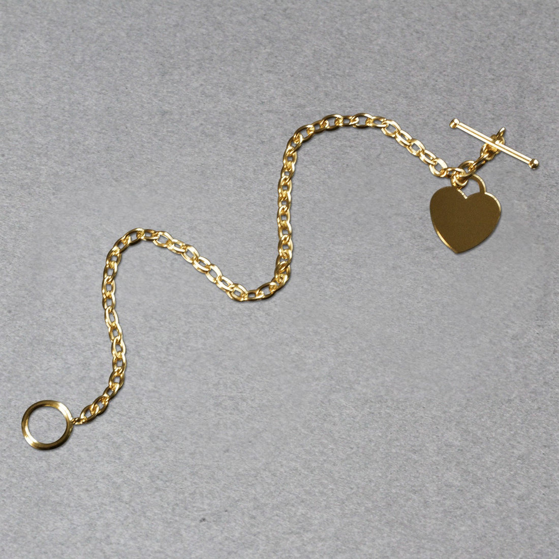 Pulsera de palanca con dije de corazón en oro amarillo de 14 k (4,80 mm)