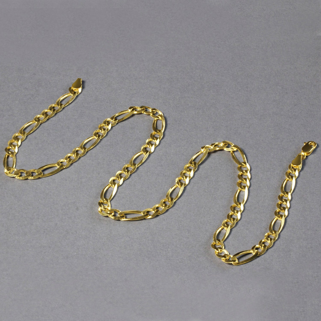Cadena Figaro maciza de oro amarillo de 10 quilates (5,30 mm)