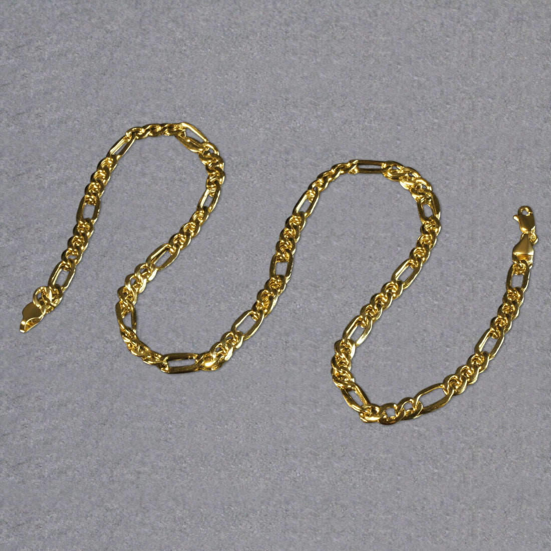 Cadena Figaro Lite de oro amarillo de 10 k (5,60 mm)