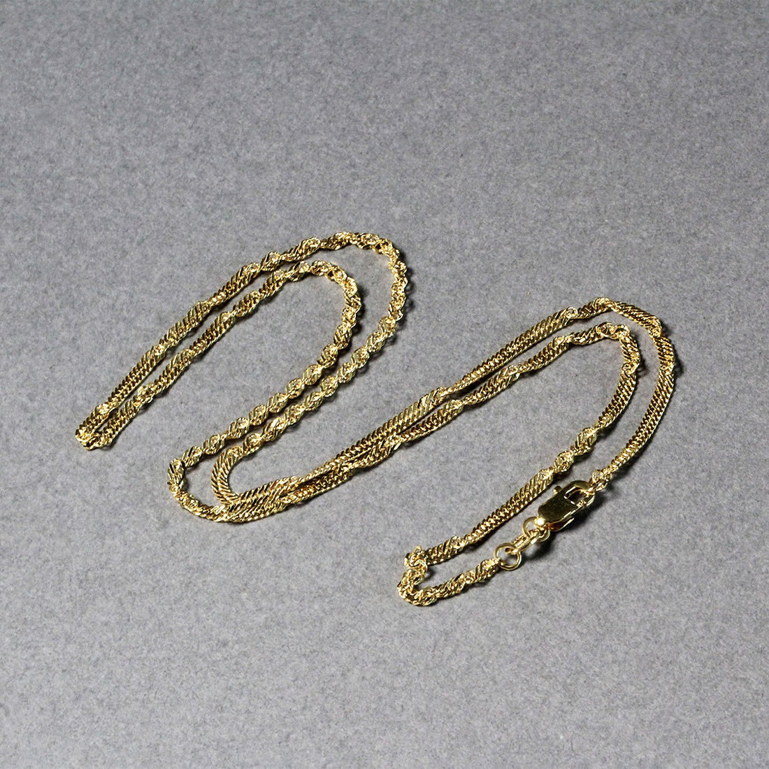 Cadena Singapur de oro amarillo de 10 k (1,80 mm)