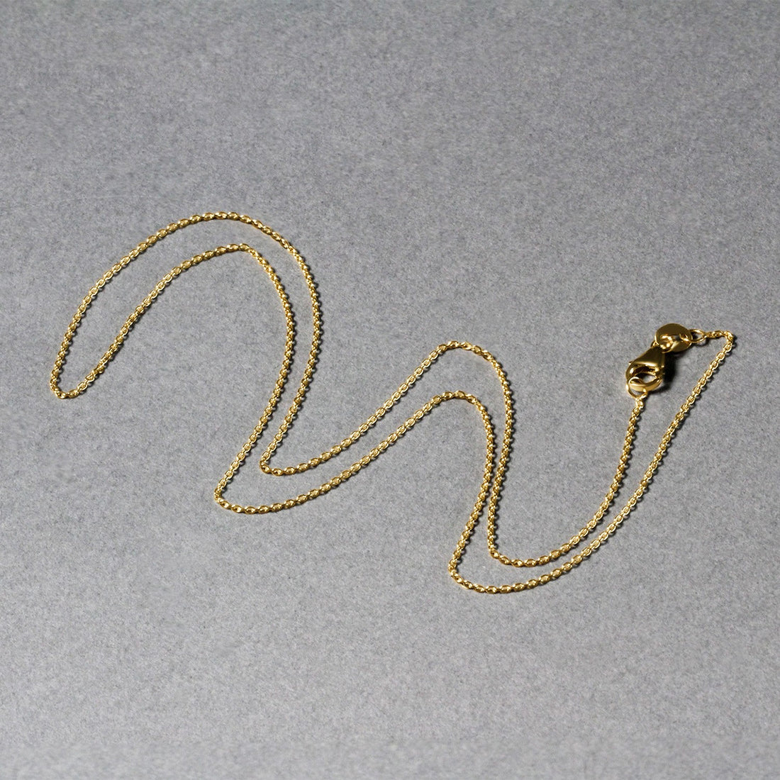 Cadena de eslabones tipo cable ovalados de oro amarillo de 10 k (0,97 mm)