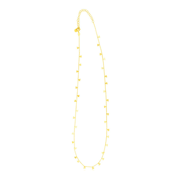 Collar de oro amarillo de 14 quilates con corazones colgantes